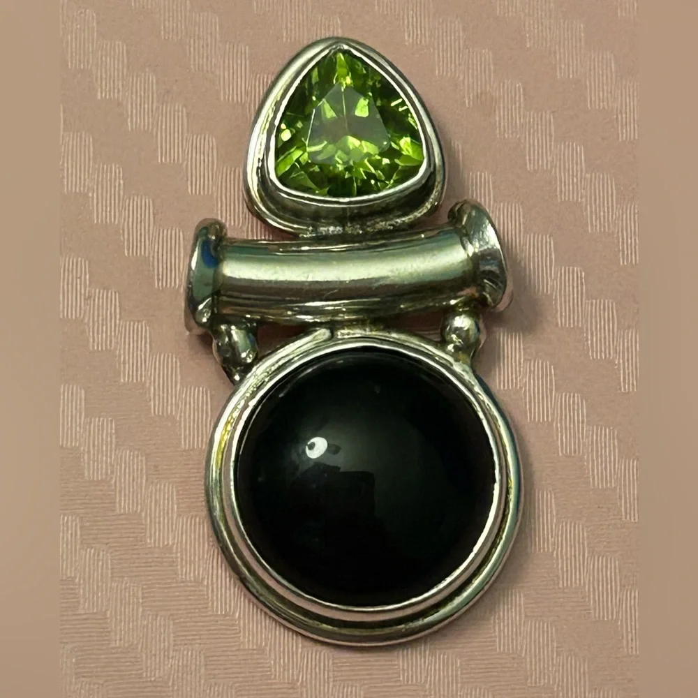 Vintage artisan made black onyx and peridot 925 silver slide pendant.